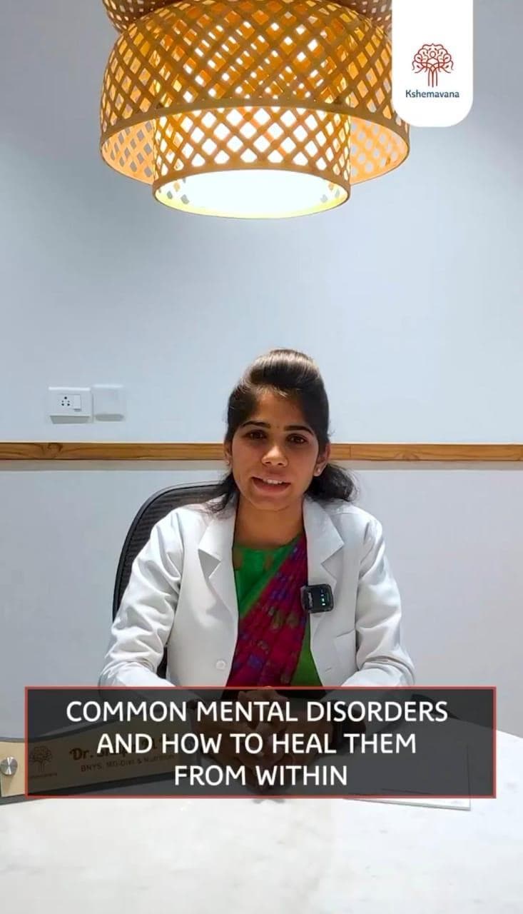 Educational video still: a doctor in a white coat discussing common mental disorders