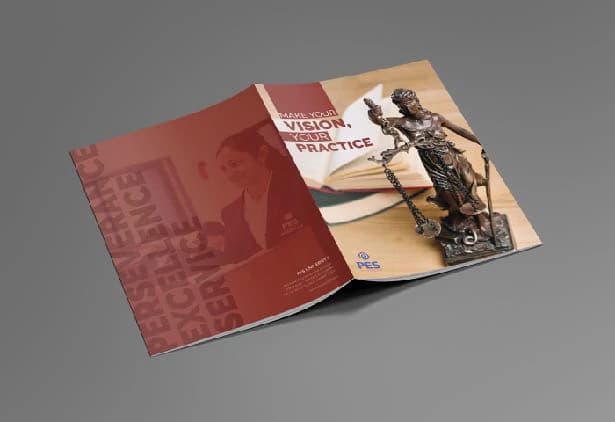 The A4 programme brochure in PES red, open on a desk beside a statue of Justice